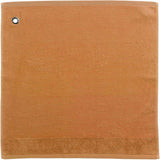 asciugamano con occhiello curl ambra, colore ambra, taglia 50 x 50. asciugamano piegato su sfondo neutro per una visione pulita del prodotto