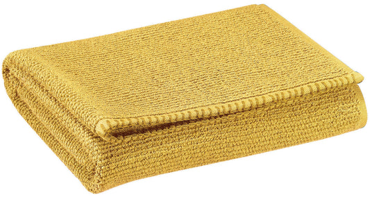 asciugamano da bagno bora curry, colore curry, taglia 90 x 150. asciugamano piegato su sfondo neutro per una visione pulita del prodotto