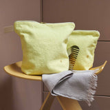 trousse da toilette iona luce del sole, colore luce del sole, taglia 22 x 18 x 7,5. dettaglio del prodotto da bagno