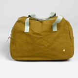 borsa weekend iona noci, colore noci, taglia 28 x 42 x 20. realizzata in 100% cotone bio, pensata per viaggiare con stile e sostenibilità