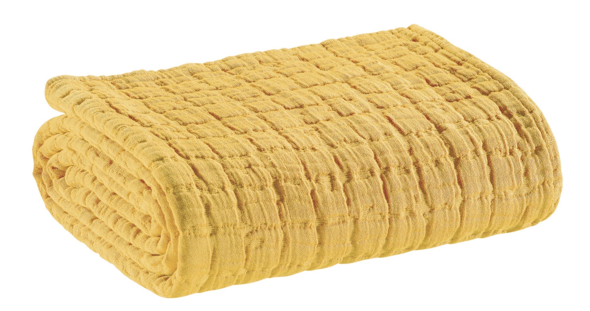 coperta swami curry, colore curry, taglia 180 x 260. vista frontale della coperta piegata su sfondo bianco