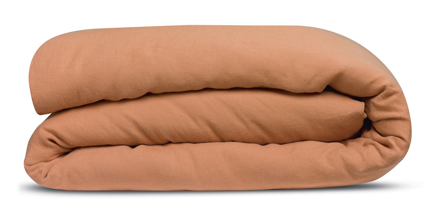 copripiumino kala cannella, colore cannella, taglia 240 x 220. copripiumino piegato su sfondo neutro per una visione...