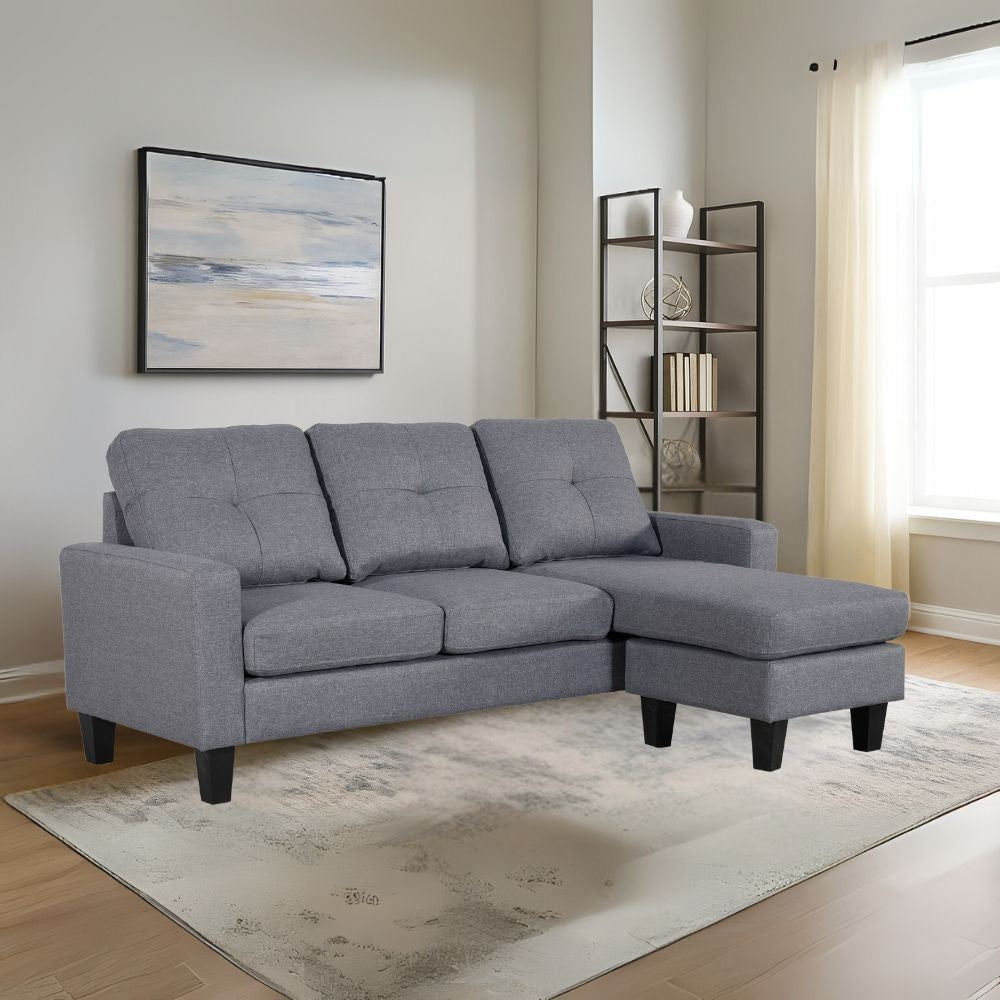 divano 3 posti giulivo grigio con chaise longue componibile, divano visto frontalmente, ideale per soggiorni moderni e accoglienti