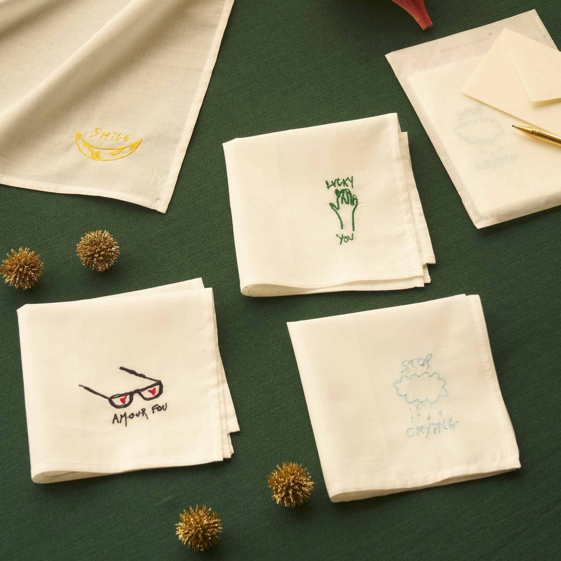 fazzoletto hankie lucky verde, colore verde, taglia 25 x 25. dettaglio del prodotto da bagno