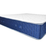 materasso matrimoniale palladio con bordo blu 160x190x25 h cm. in schiuma poliuretanica e memory non sfoderabile, materasso in ambientazione camera matrimoniale moderna