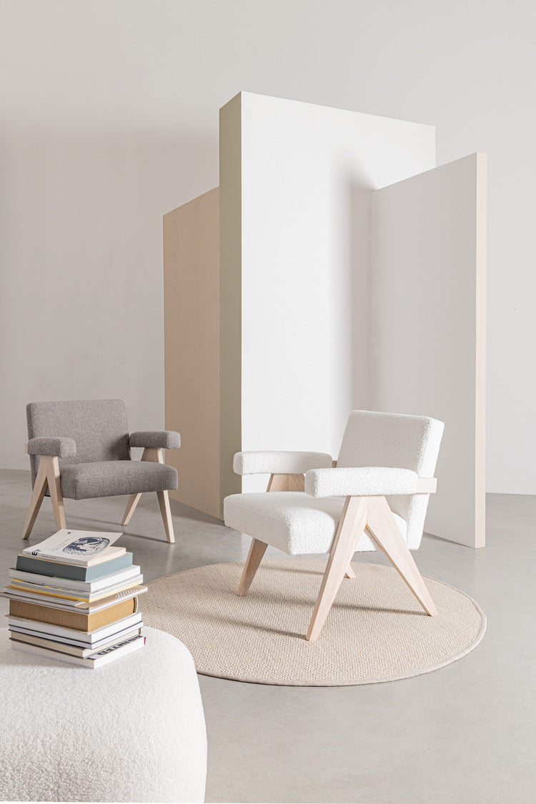 poltrona faiza in tessuto effetto bouclé tortora e gambe in legno rubberwood, disponibile in diverse colorazioni per...