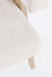 poltrona faiza in tessuto effetto bouclé avorio e gambe in legno rubberwood, disponibile in diverse colorazioni per...