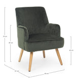 poltrona adeline in tessuto effetto velluto verde forest e legno, vista ambientata in soggiorno o angolo lettura