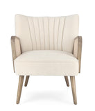 poltrona virna in tessuto effetto velluto avorio, gambe e braccioli in legno naturale, vista ambientata in soggiorno o...