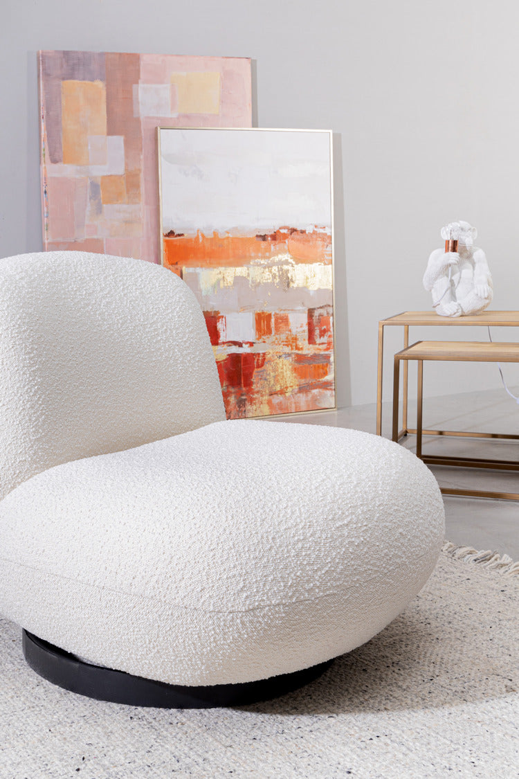poltrona girevole margot in tessuto effetto bouclé bianco, disponibile in diverse colorazioni per adattarsi a ogni ambiente