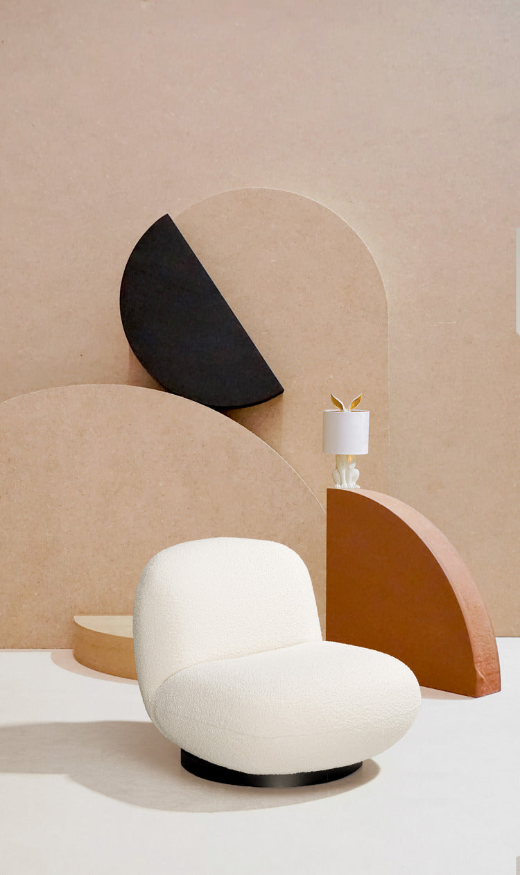 poltrona girevole margot in tessuto effetto bouclé bianco, design ergonomico per il massimo benessere quotidiano