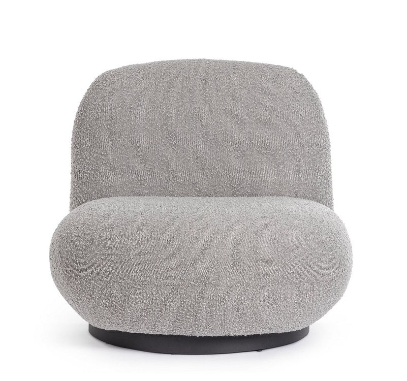 poltrona girevole margot in tessuto effetto bouclé grigio, vista ambientata in soggiorno o angolo lettura