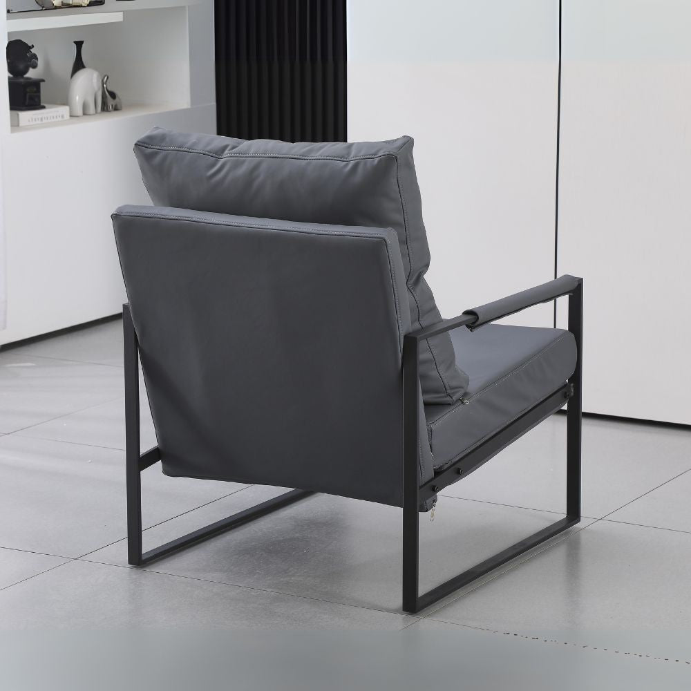 poltrona gimmy in ecopelle grigio scuro e struttura in metallo nero, dettaglio del rivestimento in tessuto o velluto