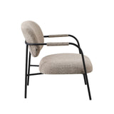 poltrona nat con struttura in metallo nero e seduta in tessuto teddy tortora, perfetta per aggiungere comfort ed eleganza all’arredamento