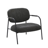 poltrona nat con struttura in metallo nero e seduta in tessuto teddy grigio scuro, dettaglio del rivestimento in tessuto o velluto