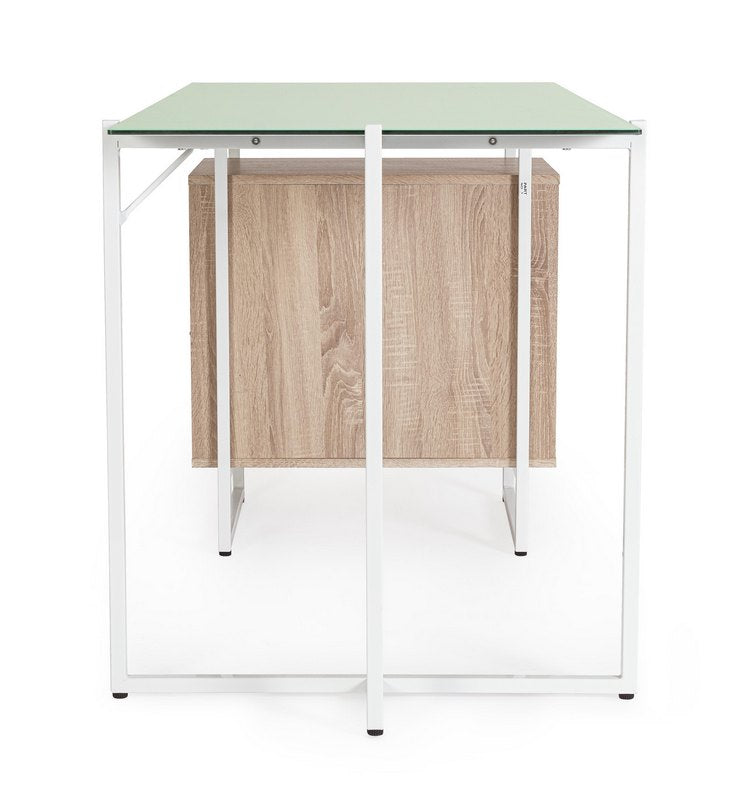 scrivania thomas in vetro temperato e base acciaio bianco, con cassettiera 142 x 69 cm, ambientazione d’arredo con il...