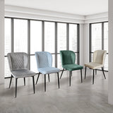 set di 4 sedie soho effetto velluto azzurro, vista ambientata attorno a un tavolo da pranzo