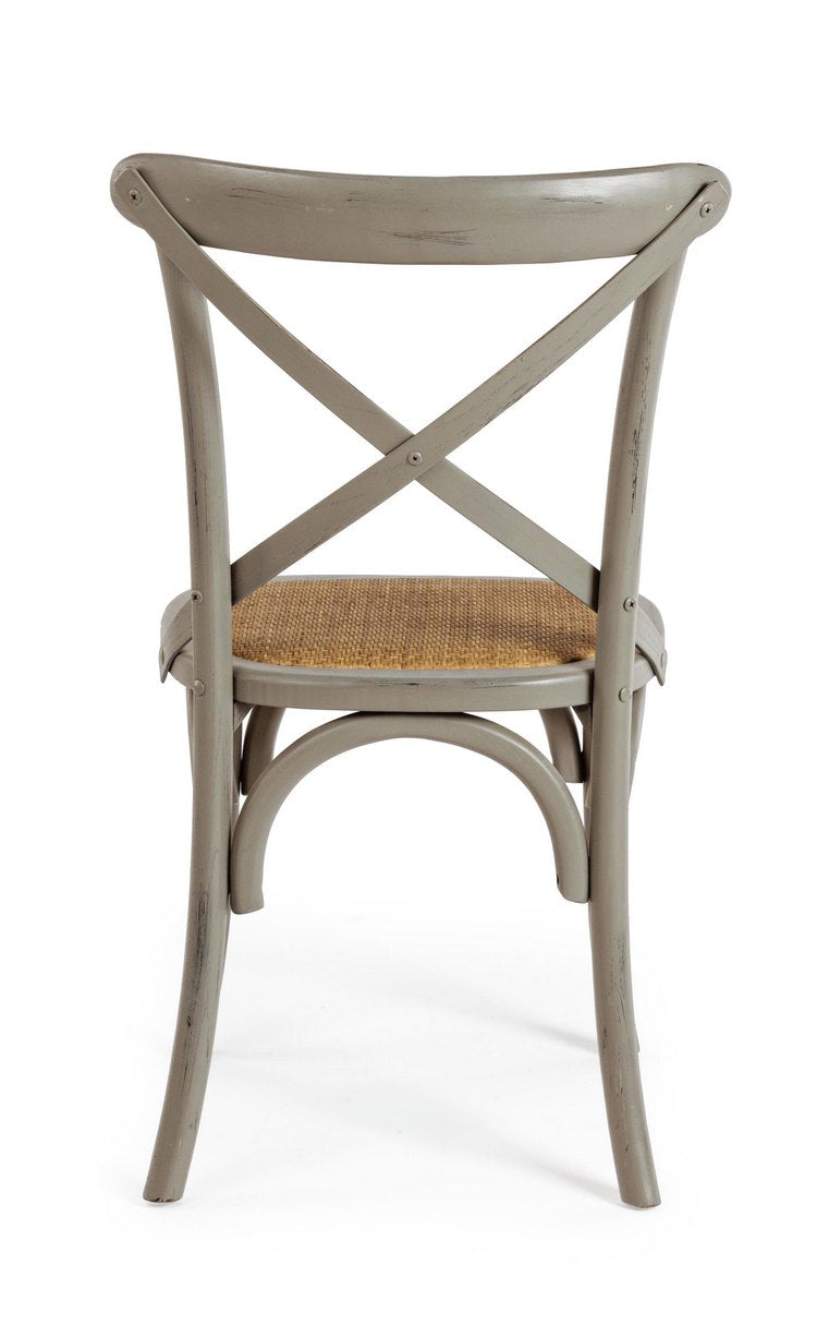 set di 2 sedie cross in legno di olmo grigio scuro e rattan naturale, vista ambientata attorno a un tavolo da pranzo