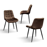 set di 4 sedie barcellona rivestite in velluto marrone e gambe in metallo nero, vista ambientata attorno a un tavolo da...