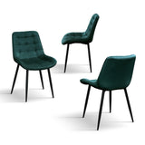 set di 4 sedie barcellona rivestite in velluto verde scuro e gambe in metallo nero, vista ambientata attorno a un tavolo da...