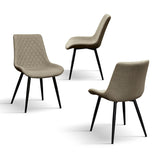 set di 4 sedie vienna in tessuto beige e gambe in metallo nero, vista ambientata attorno a un tavolo da pranzo