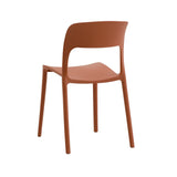 set di 4 sedie south beach in polipropilene terracotta, ambientazione su terrazza, veranda o prato