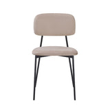 sedia shen in vellutino colore taupe e struttura in metallo nero, vista ambientata in soggiorno o sala da pranzo