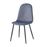 sedia imbottita bretta in vellutino colore grigio e gambe nere, vista ambientata in soggiorno o sala da pranzo