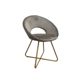 poltroncina etere in velluto grigio con gambe in metallo dorato, dettaglio dell’imbottitura morbida e confortevole