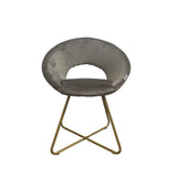 poltroncina etere in velluto grigio con gambe in metallo dorato, vista ambientata in soggiorno o sala da pranzo