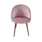 sedia despina in tessuto colore rosa e gambe in metallo oro rosa, vista ambientata in soggiorno o sala da pranzo