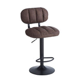 sgabello tati con seduta in ecopelle brown e gamba in metallo nero, dettaglio della seduta imbottita o in legno