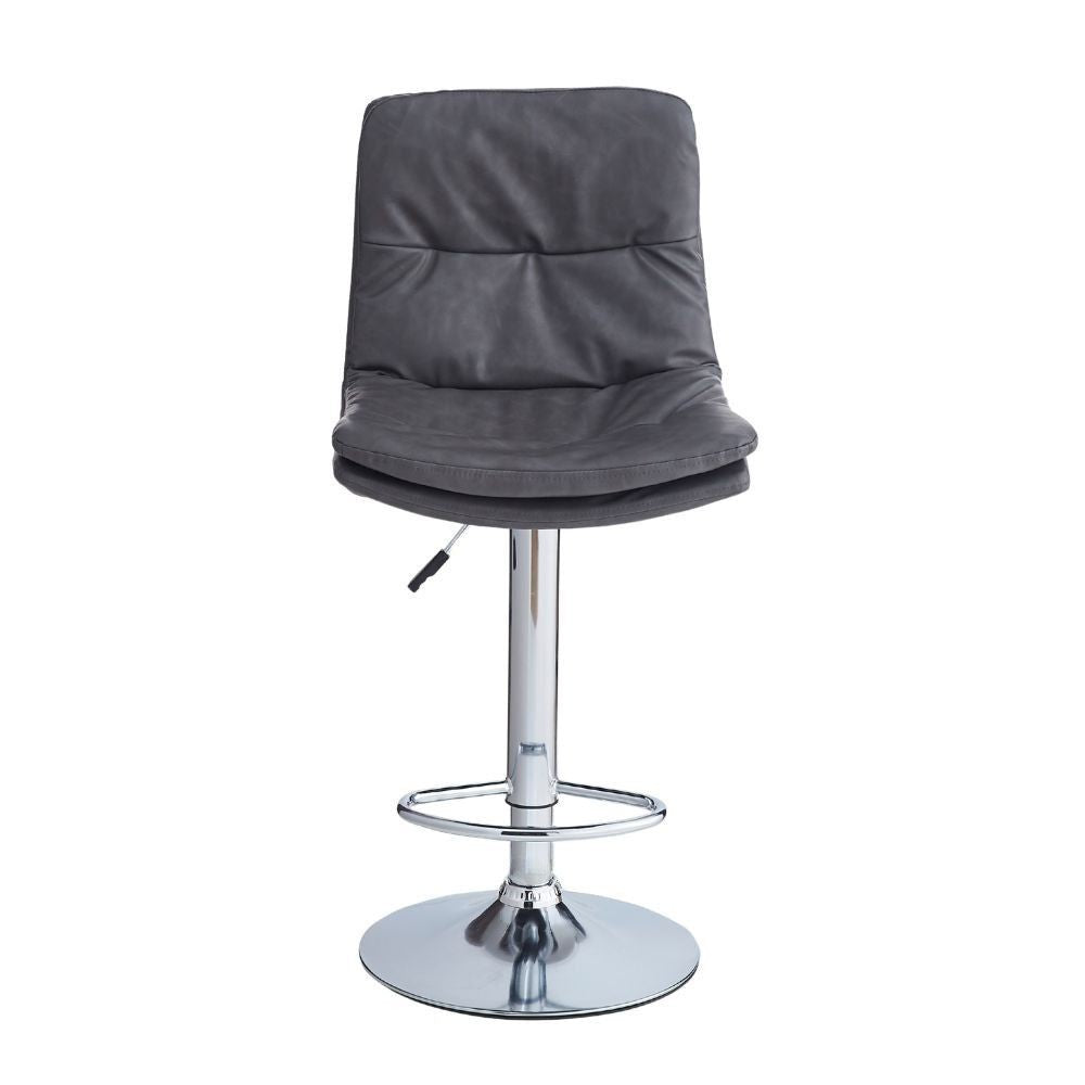 sgabello paco con seduta in ecopelle grigio e gamba in metallo inox, vista ambientata accanto a bancone o isola