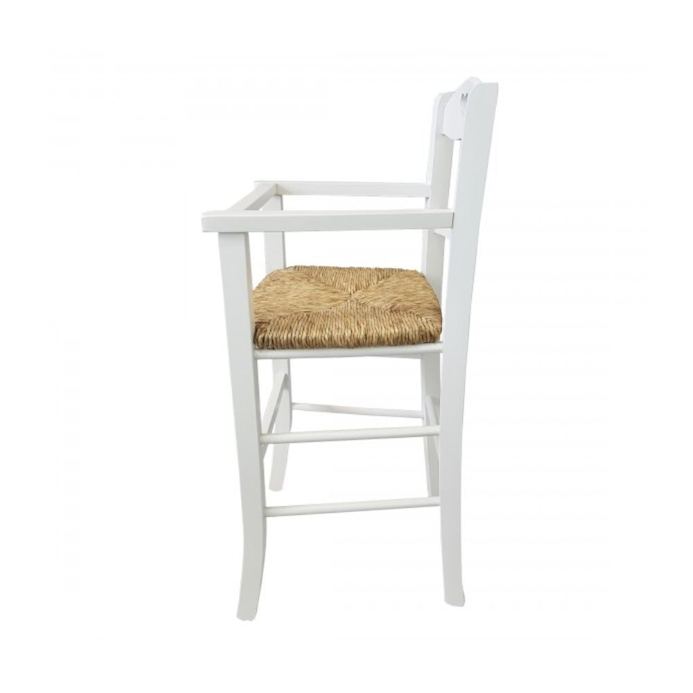sediolone bimbo 708 legno bianco e seduta paglia, vista ambientata accanto a bancone o isola