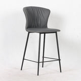 sgabello core colore antracite con gambe in metallo nero, dettaglio della seduta imbottita o in legno