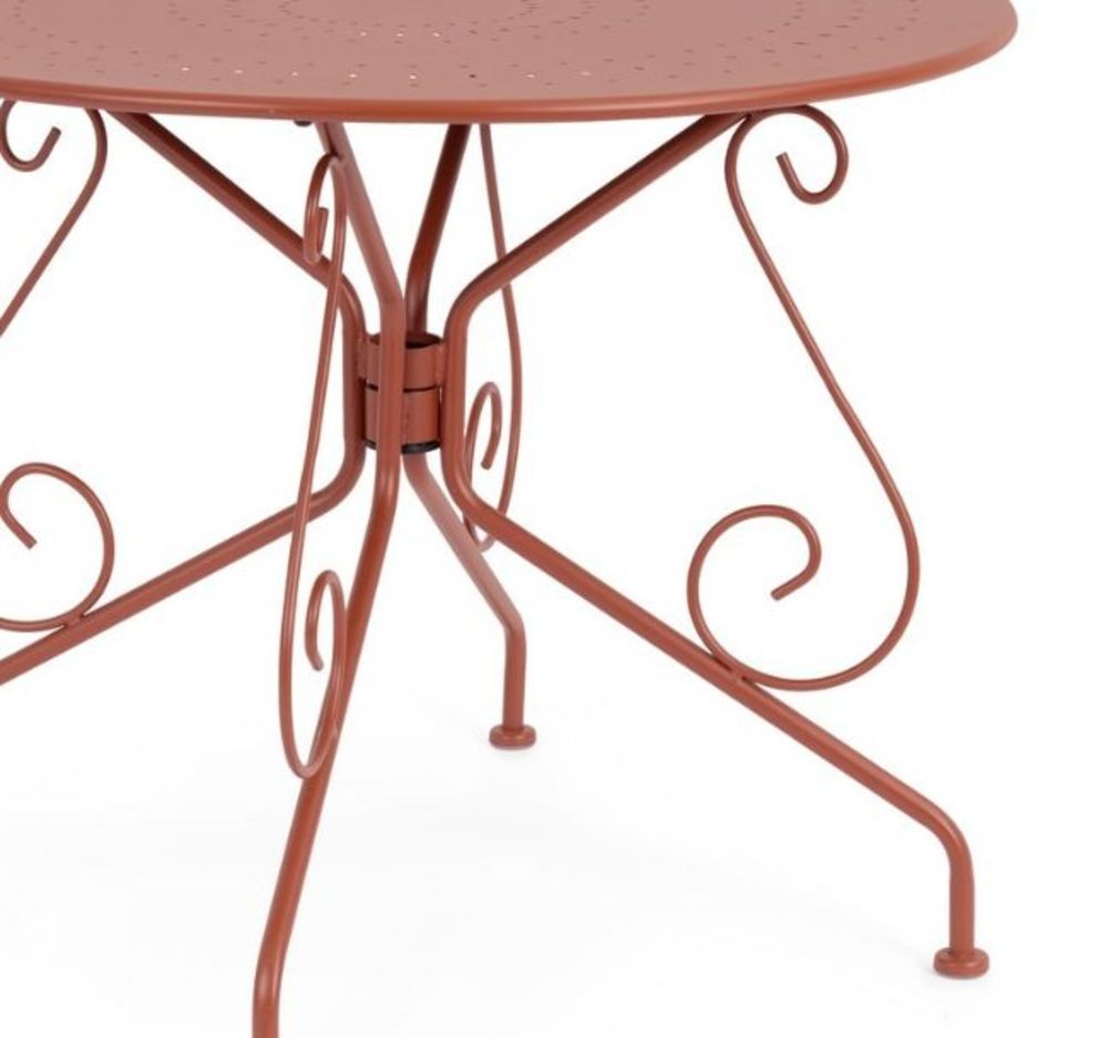 tavolo etienne in acciaio rosso ø90 cm, ambientazione in giardino con sedie coordinate
