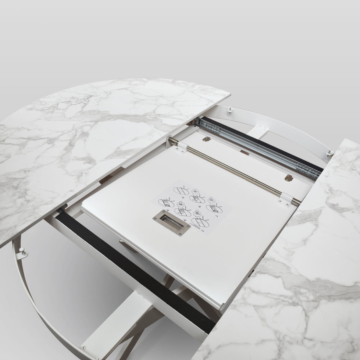 tavolo filicudi rotondo ø120 allungabile, in ceramica effetto marmo e base bianca metallo, ideale per ospitare pranzi o...