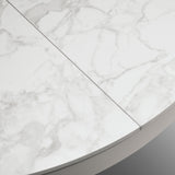 tavolo filicudi rotondo ø120 allungabile, in ceramica effetto marmo e base bianca metallo, superficie resistente e facile da...