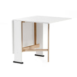 tavolo pieghevole salvaspazio mati 74x136 colore bianco frassinato, dettaglio della superficie allungata e gambe robuste