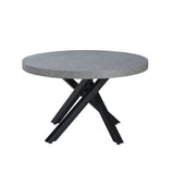 tavolo allungabile raven con piano colore cemento e gambe in metallo nero, dettaglio del piano circolare e supporto centrale