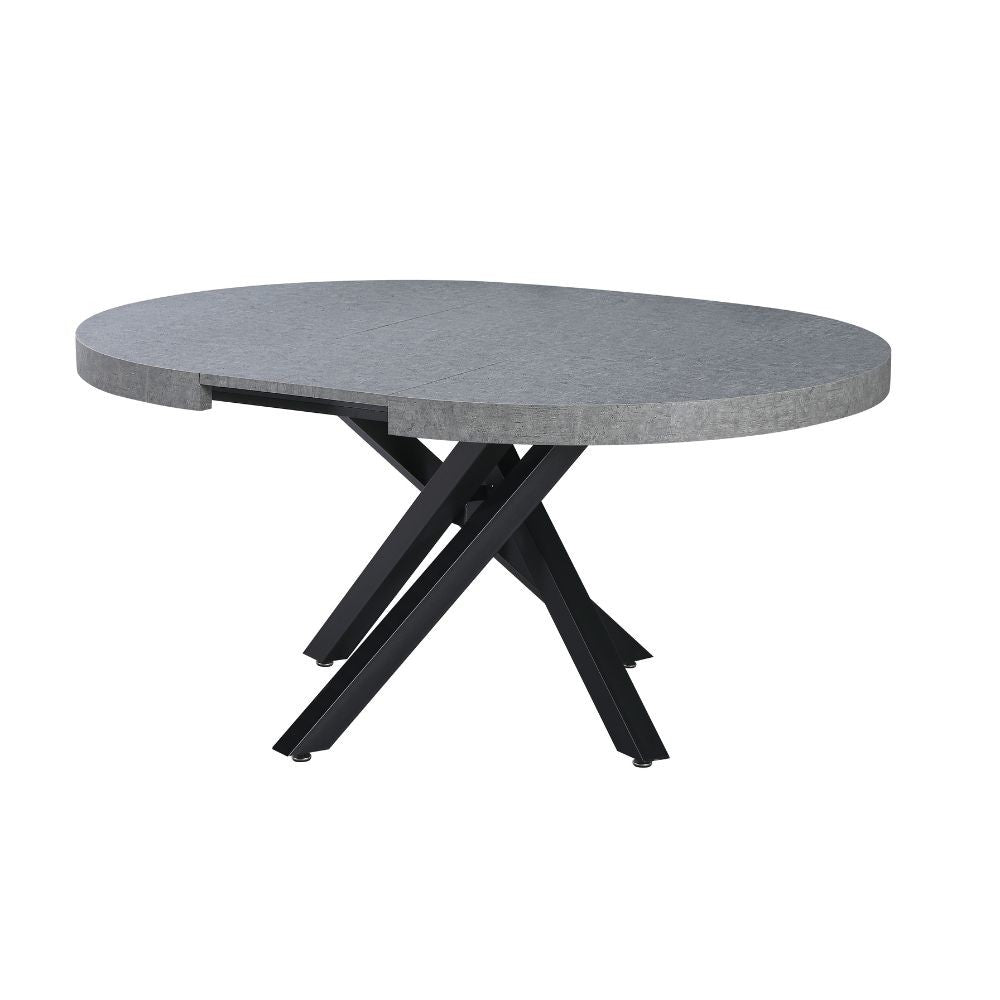 tavolo allungabile raven con piano colore cemento e gambe in metallo nero, vista ambientata in sala da pranzo elegante