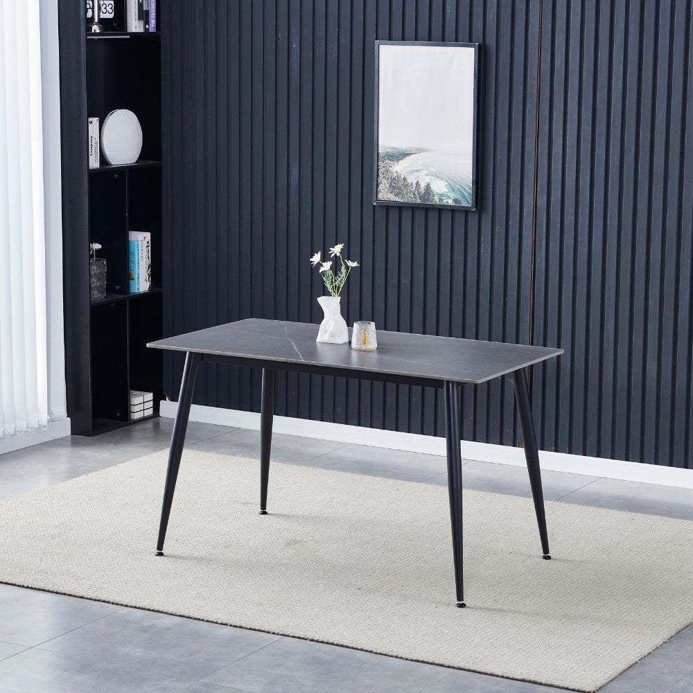tavolo mila 140x80 con top in ceramica effetto marmo grigio opaco e gambe in metallo nero, finitura di qualità per uso quotidiano