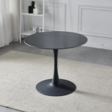 tavolo rotondo dot con piano in ceramica effetto marmo nero opaco con particolari oro e gamba nera, dettaglio del piano circolare e supporto centrale