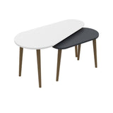 doppio tavolino pear bianco e antracite con gambe in legno, ambientato con divani moderni o classici