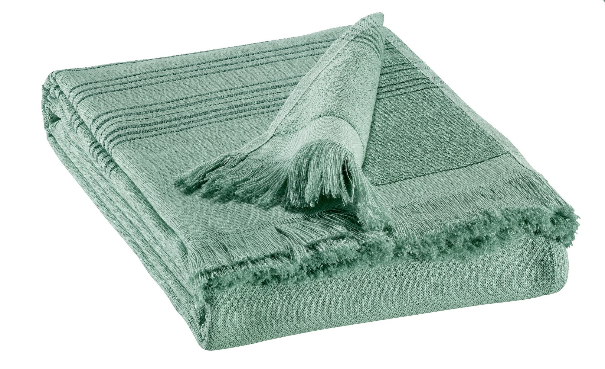 telo hammam cancun salvia, colore salvia, taglia 90 x 180. telo hammam elegante piegato con cura su sfondo neutro