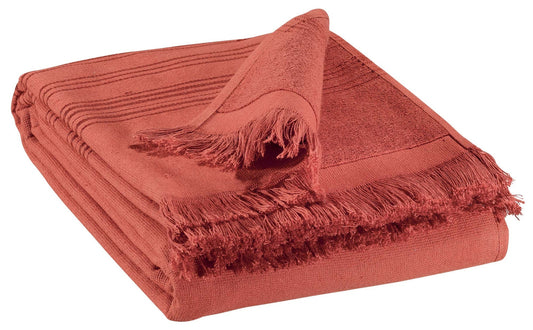 telo hammam cancun tomette, colore tomette, taglia 90 x 180. telo hammam elegante piegato con cura su sfondo neutro