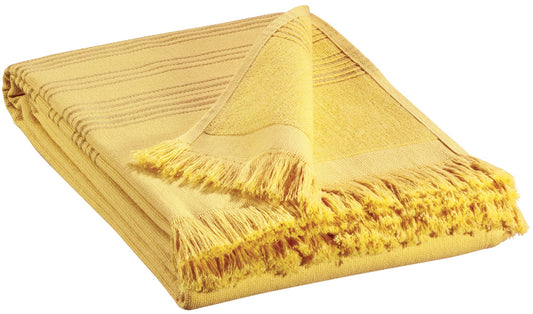 telo hammam cancun curry, colore curry, taglia 90 x 180. telo hammam elegante piegato con cura su sfondo neutro