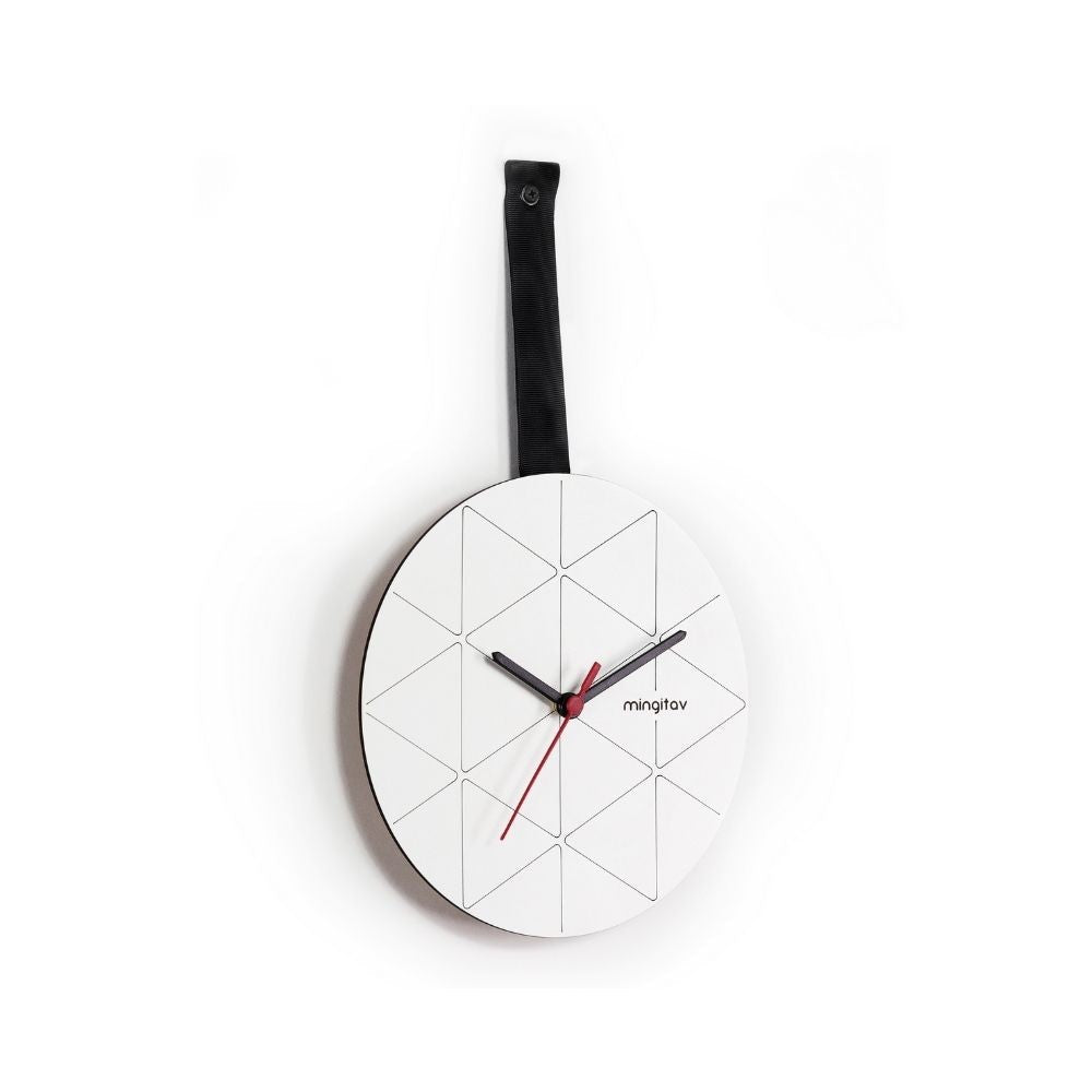 orologio da parete minuetto nero e bianco mt192101, ambientazione d’arredo con il prodotto protagonista