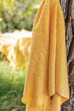 asciugamano zoe mimosa, colore mimosa, taglia 100 x 180. asciuga rapidamente lasciando una piacevole sensazione