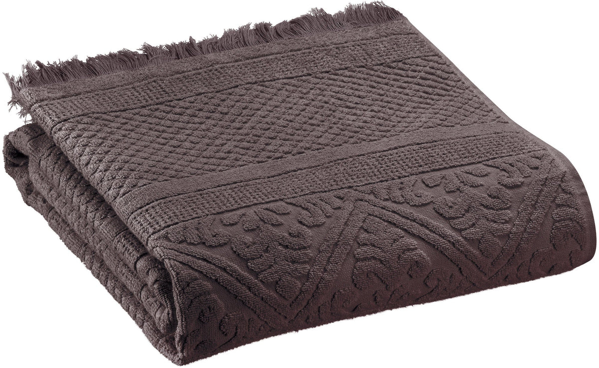 asciugamano da doccia zoe ebano, colore ebano, taglia 70 x 140. asciugamano piegato su sfondo neutro per una visione pulita del prodotto